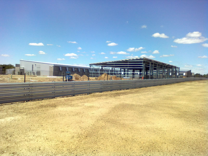 Completed phase 1 garage next to a phase 2 skeleton
